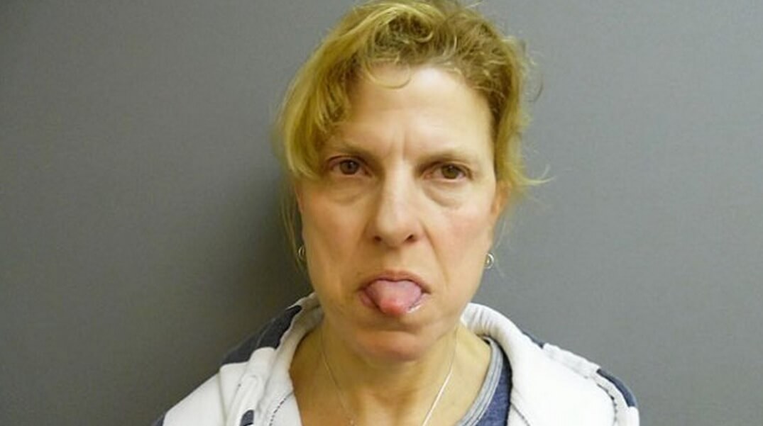 Massachusetts woman flips cops the tongue after drunk driving bust