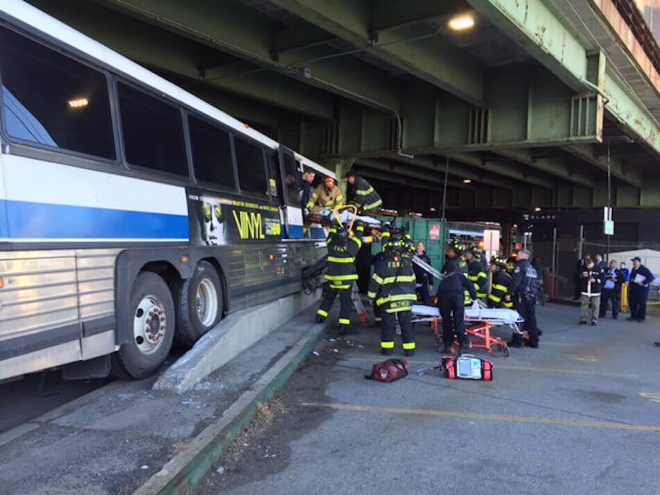 9 injured after MTA bus crashes into overpass in Midtown