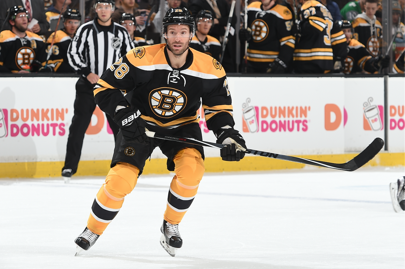 Dominic Moore helping to lead Bruins 