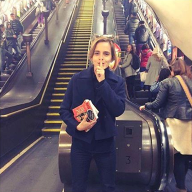LOOK: Emma Watson goes ‘book fairy’ on the city’s subways