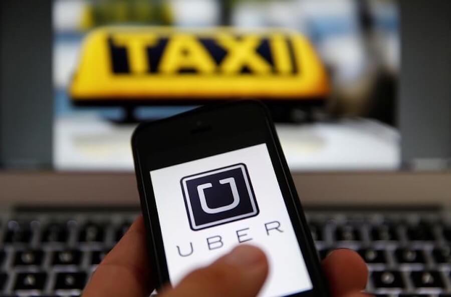 Mass. lawmakers pass new regulations on Uber and Lyft