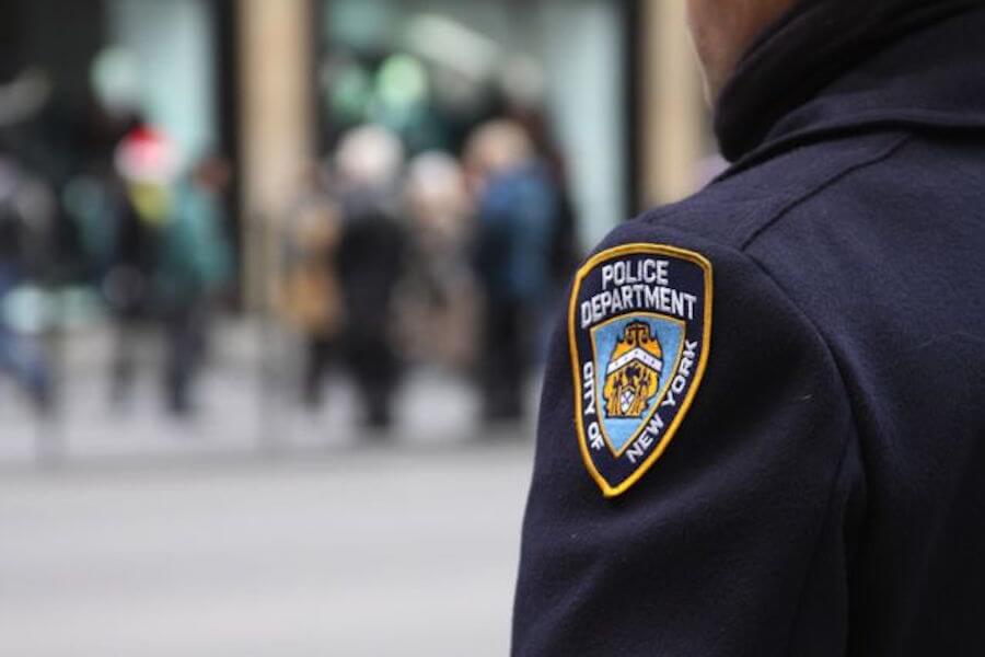 NYPD officers charged with assault on postal employee