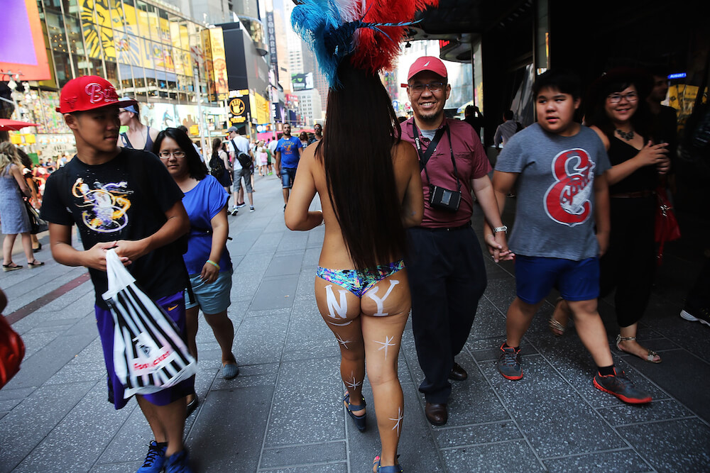 Topless Times Square lady arrested on drugs, prostitution charges