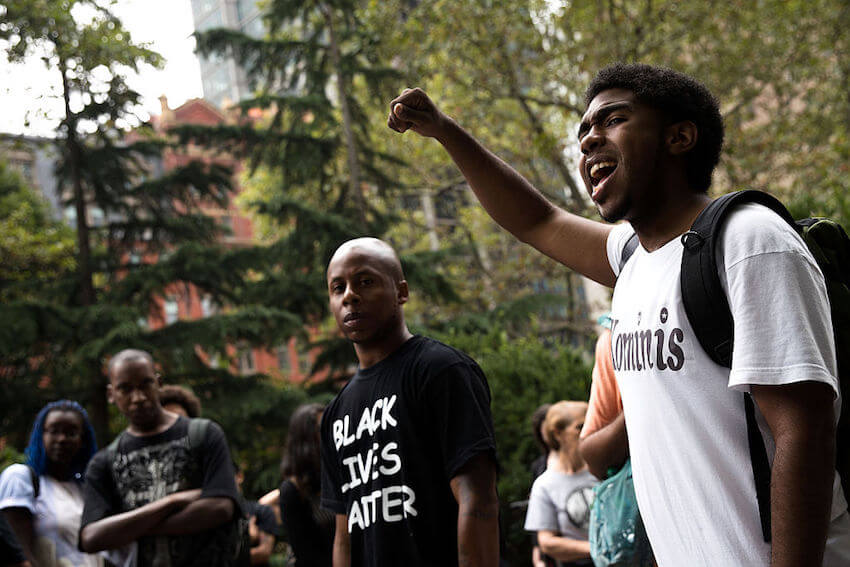 Anti-police violence group protests outside City Hall, calls for end of NYPD