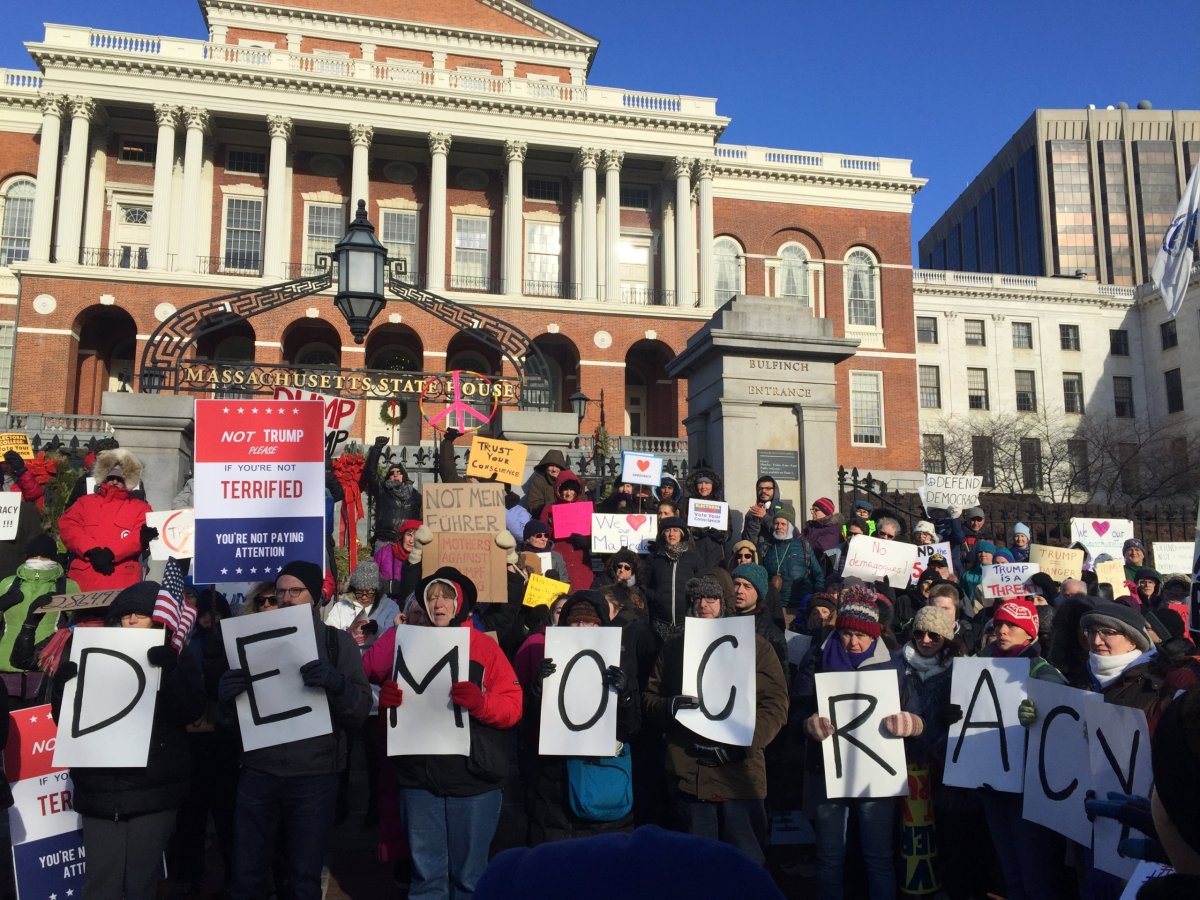 As Electoral College votes, anti-Trump activists rally