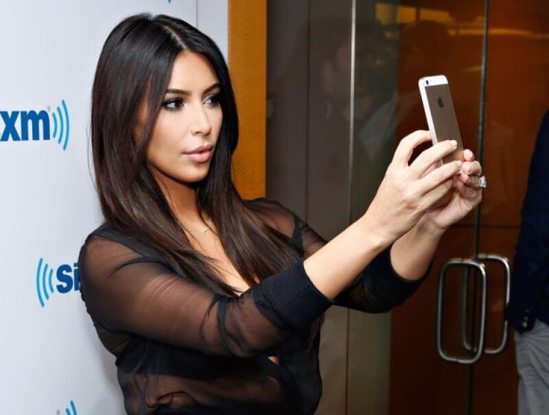 Kim Kardashian posts naked pregnant selfie to battle body shaming