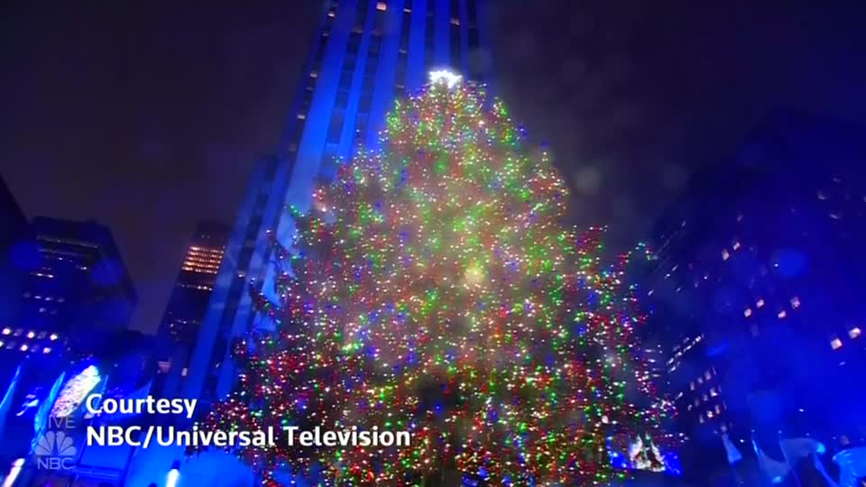 Rockefeller Christmas tree lights up New York