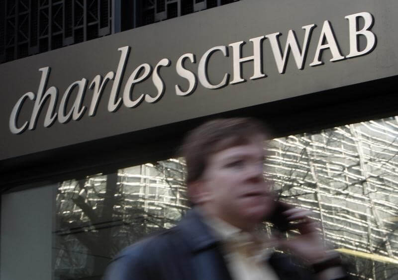 Charles Schwab first quarter profit down 7 percent on higher costs, fewer