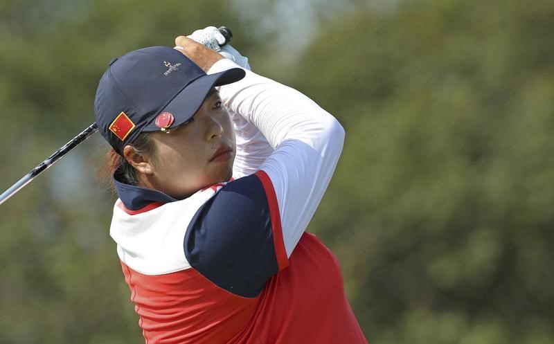 Golf: In-form Feng holds on to claim Japan Classic title