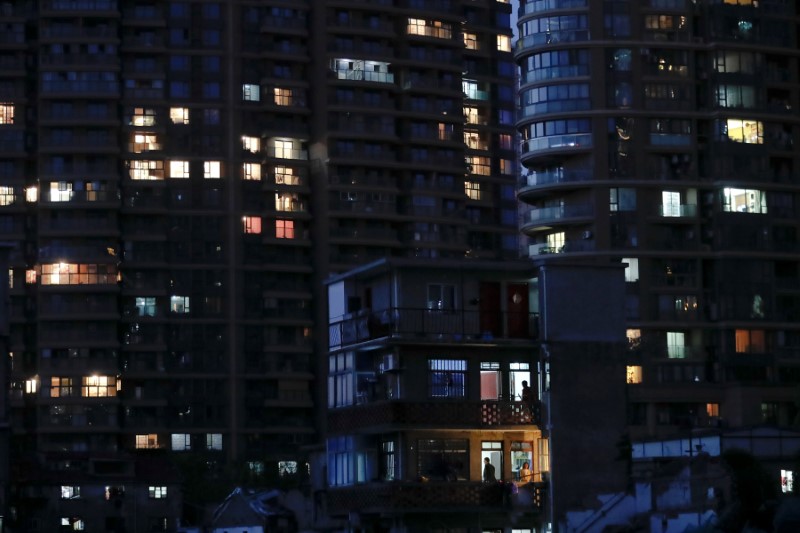 Shanghai, Tianjin beef up debt curbs to cool red-hot housing market