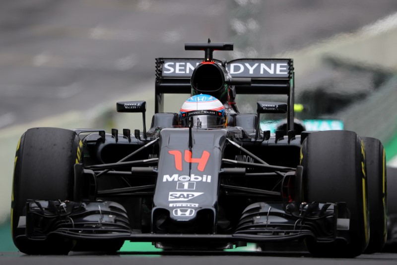 Alonso happy at McLaren, says Brown