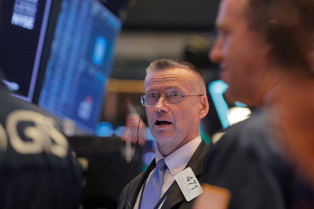Stocks flat on data, earnings; pound volatile