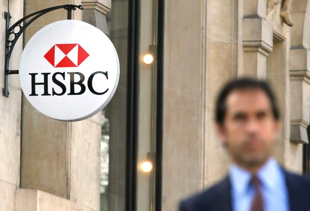 HSBC drops profit goal, warns of restructuring pain ahead as outlook darkens