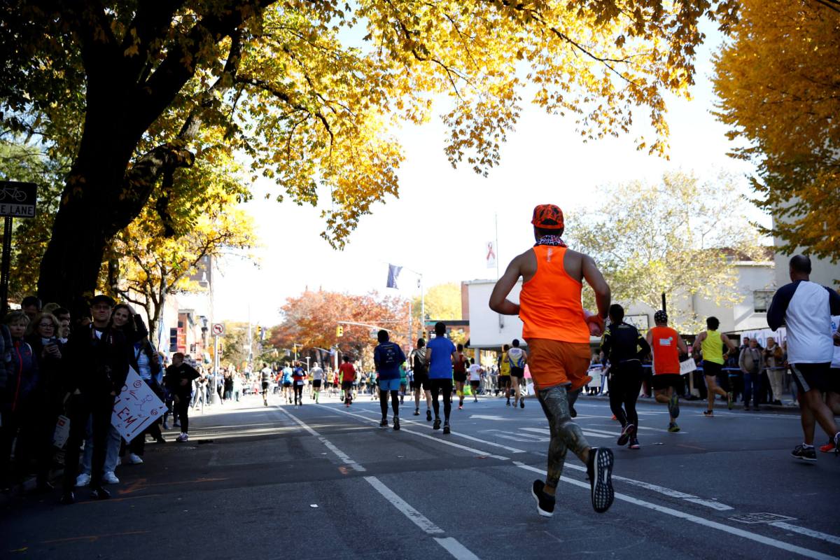 Record-busting shoes loom large in marathon debate