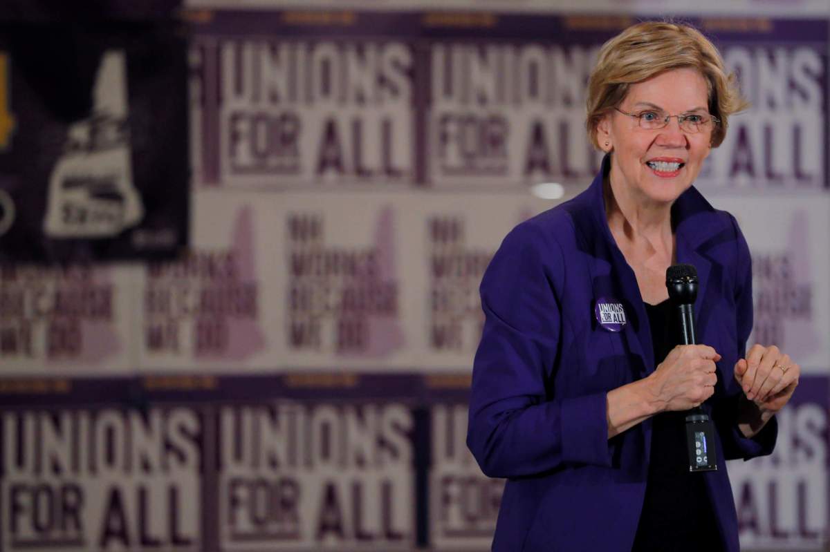 Democrat Warren outlines three-year path to ‘Medicare for All’