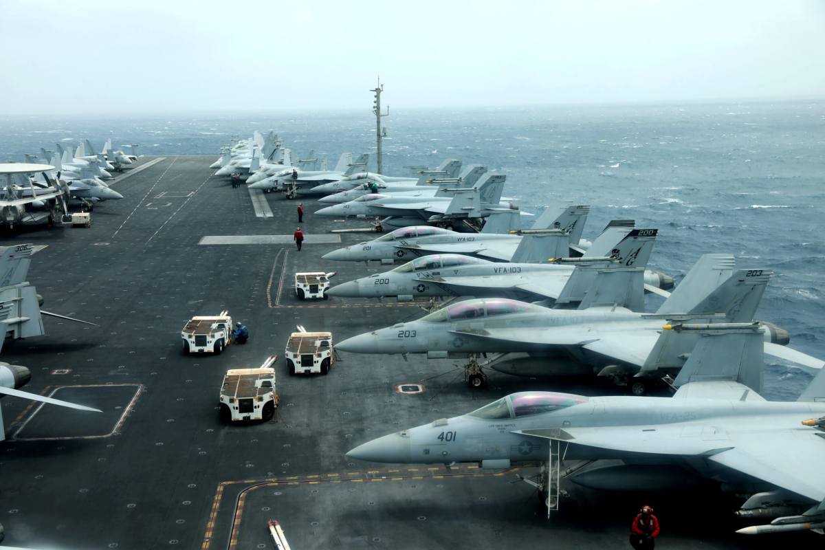 U.S. aircraft carrier strike group sails through Strait of Hormuz