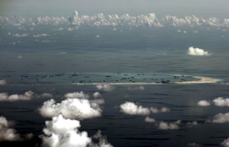 U.S. warships sail in disputed South China Sea, angering China