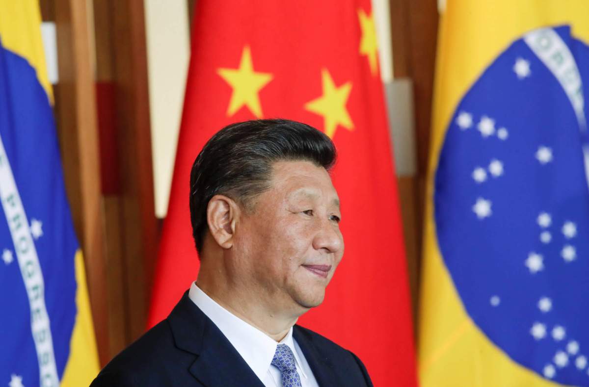 China’s Xi says he wants to work out initial trade deal with U.S.