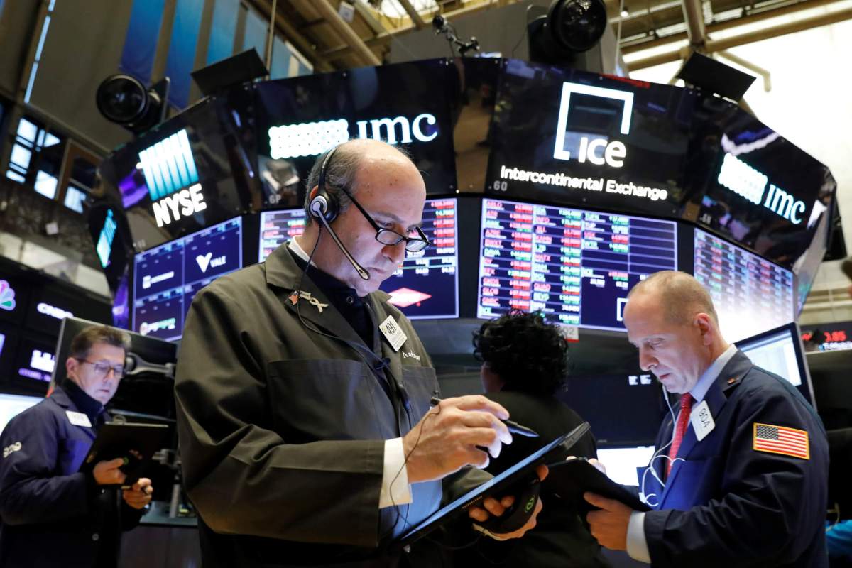 Wall Street climbs to records, fueled by trade comments
