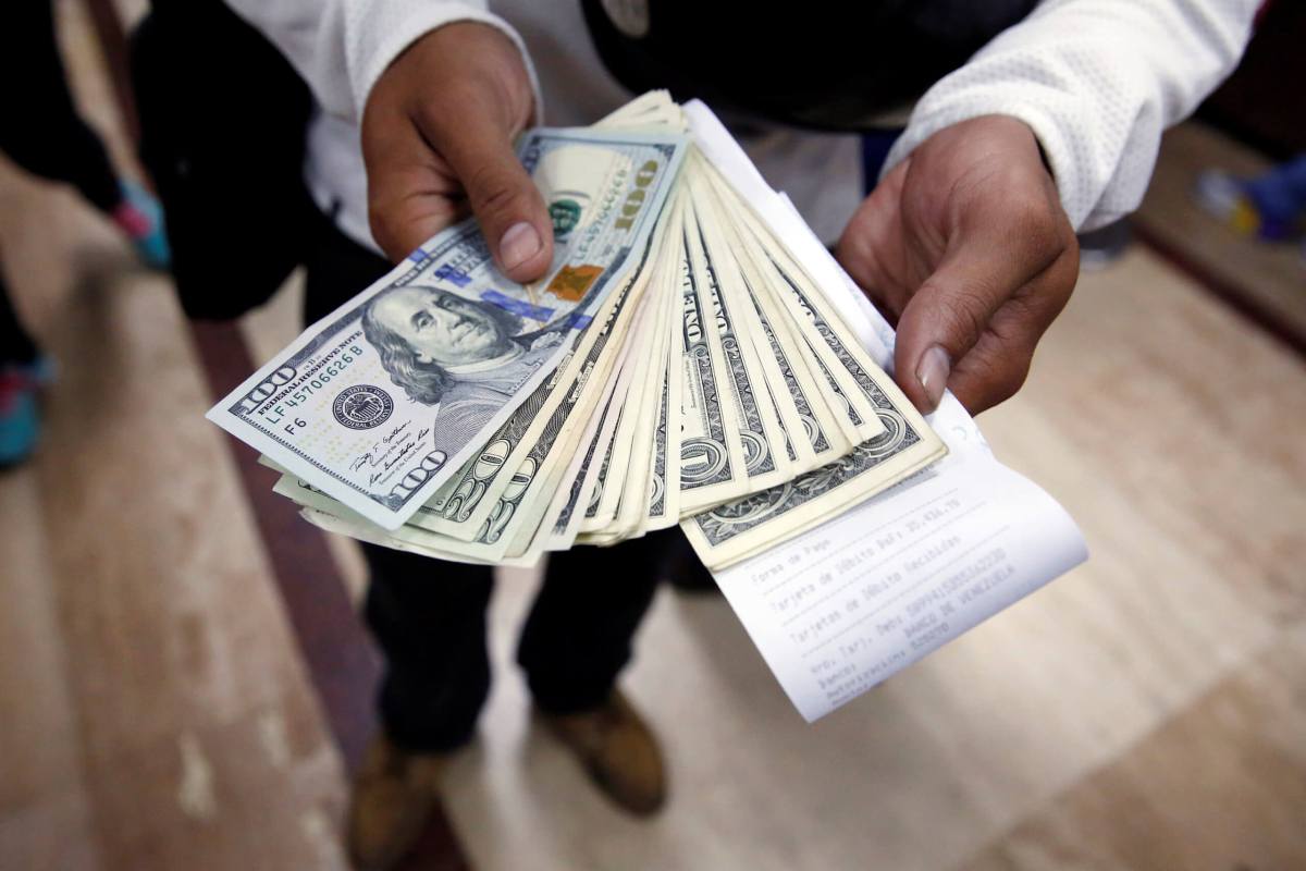 Upbeat U.S. data lifts dollar; sterling rises