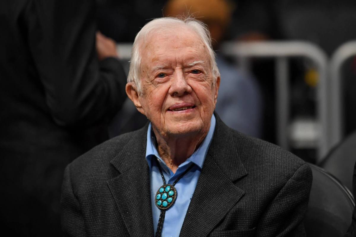 Former U.S. President Carter home for the holidays after surgery