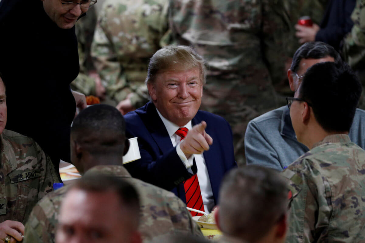 No phones, scripted tweets: How Trump’s Afghanistan trip was kept under wraps