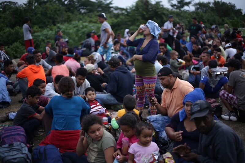 Migrant caravan gathers on Guatemala border to enter Mexico en masse