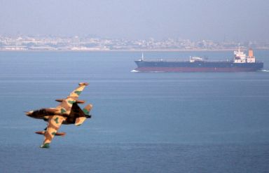 Exclusive: As Iran’s oil exports surge, international tankers help ship its
