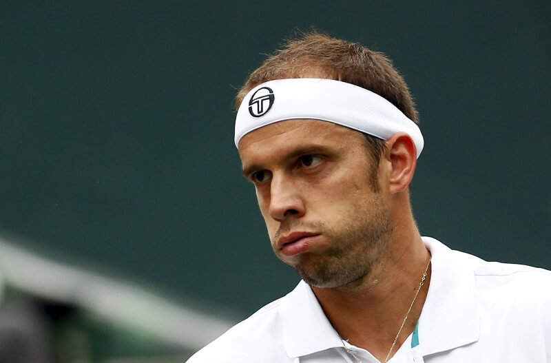 Escapologist Muller saves 10 match points to beat Isner