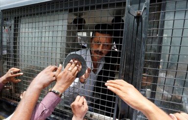 Indian court jails 11 for life over Gujarat massacre of Muslims