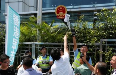 Hong Kong protesters voice outrage after bookseller detentions exposed