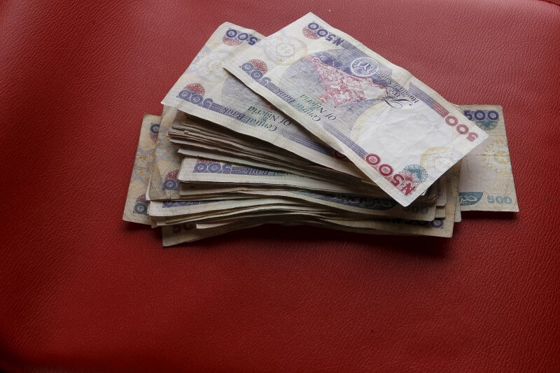 Nigeria’s naira to lose up to a third of its value on Monday after float: