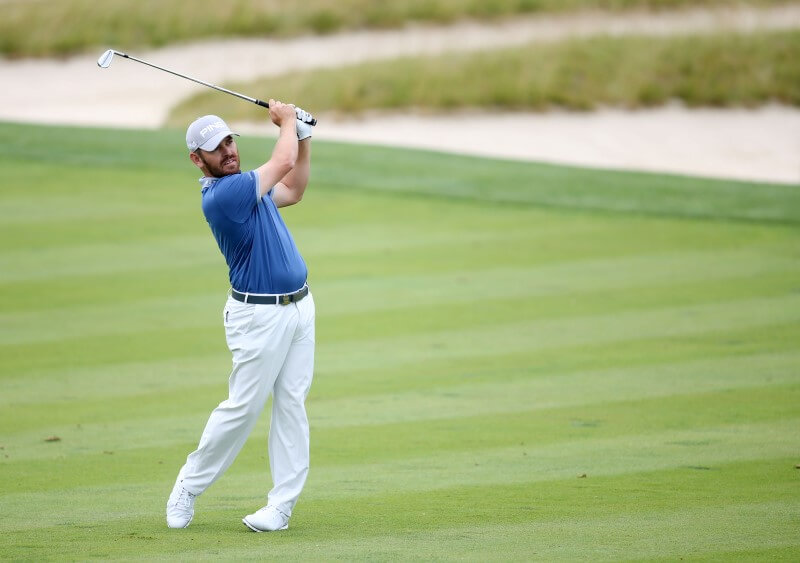 Birdie flurry on back nine lifts Oosthuizen into contention