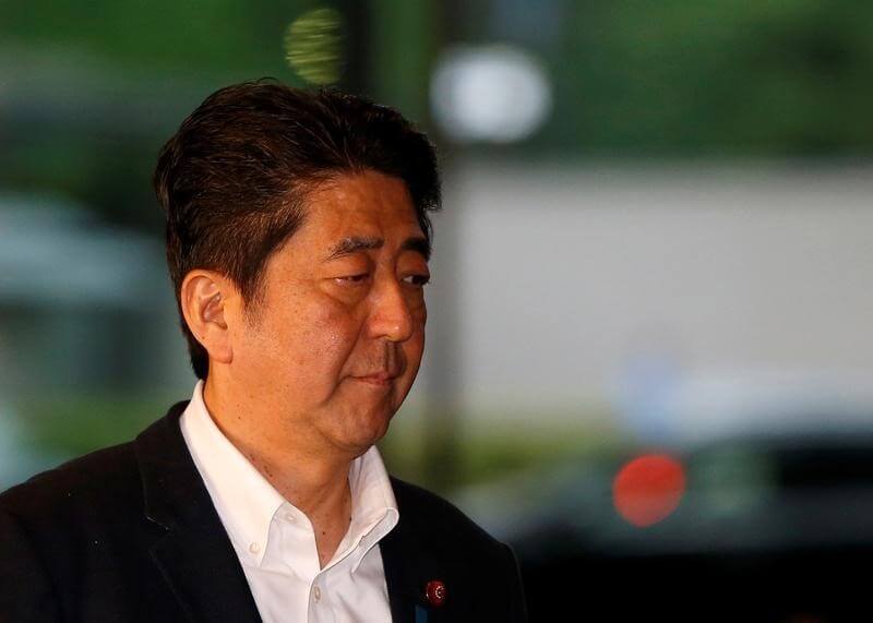 Japan PM Abe urges BOJ to provide ample funds to ensure market liquidity