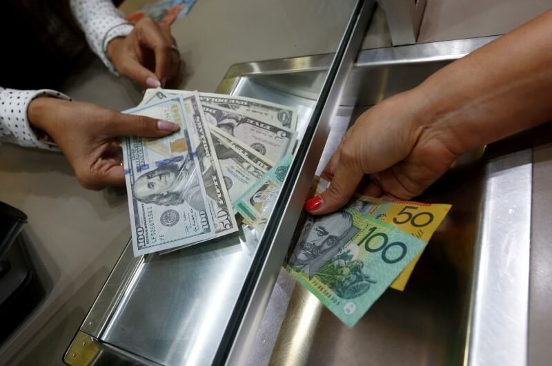 Aussie recovers from shaky start as calm returns to FX markets