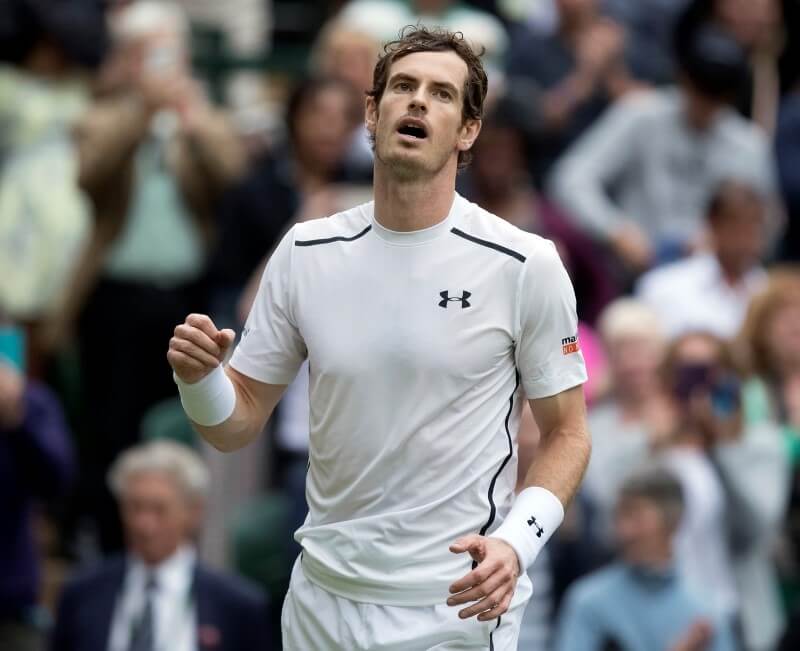 British tennis champ Andy Murray has a smash at malaria on court