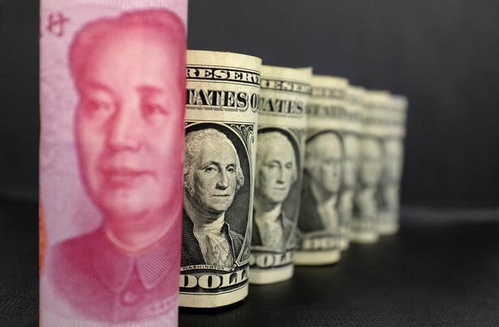 China June forex reserves unexpectedly rise but outflow fears persist