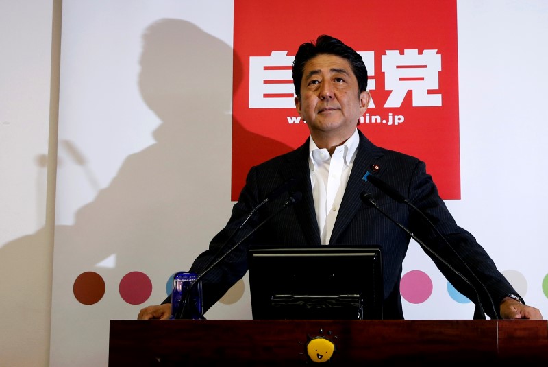 Japan Abe orders new stimulus package after election win