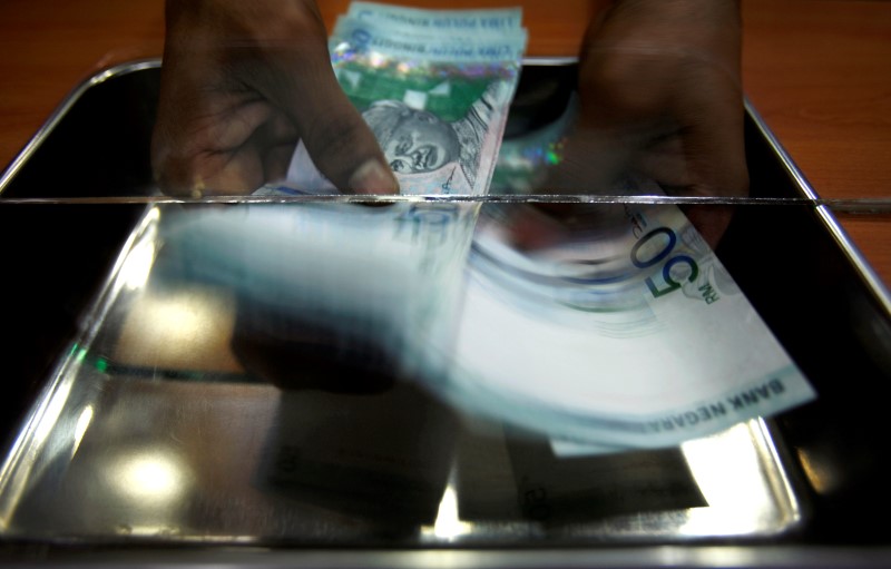 Malaysia’s central bank seen to hold key rate