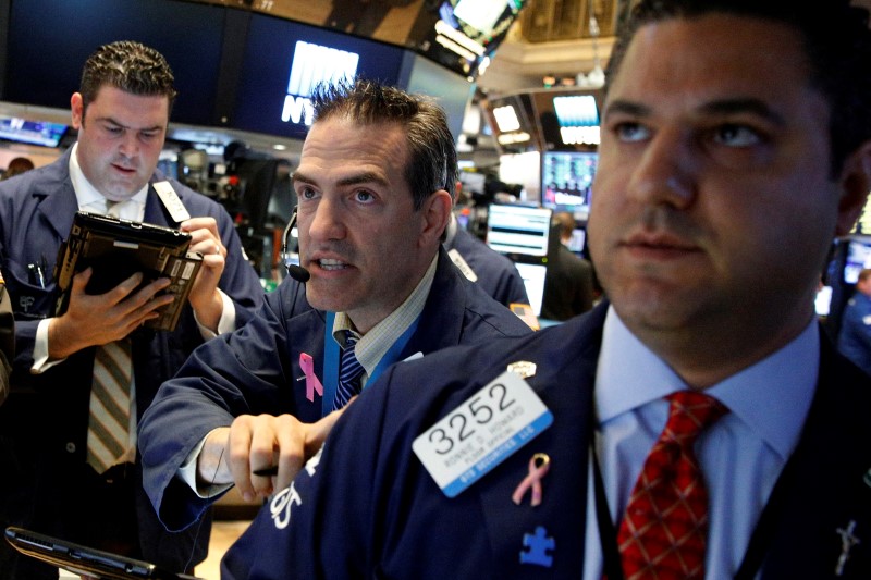 Dow, S&P hit record closing highs on greater risk tolerance