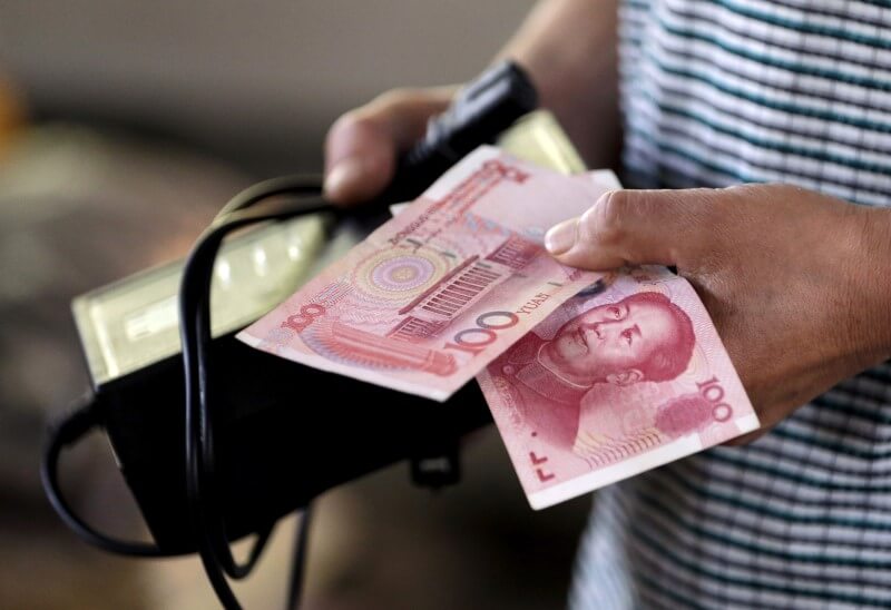 China’s yuan firms as dollar slumps globally