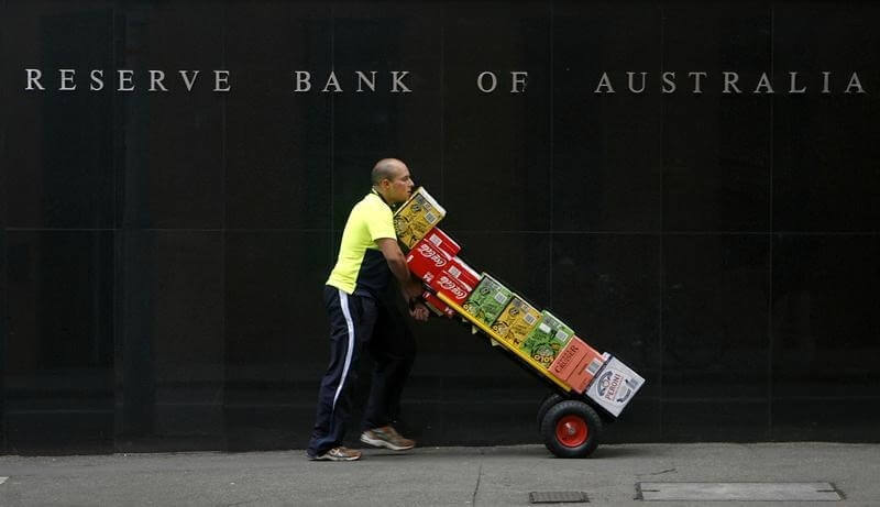 Australia cuts rates to historic lows to head off deflation