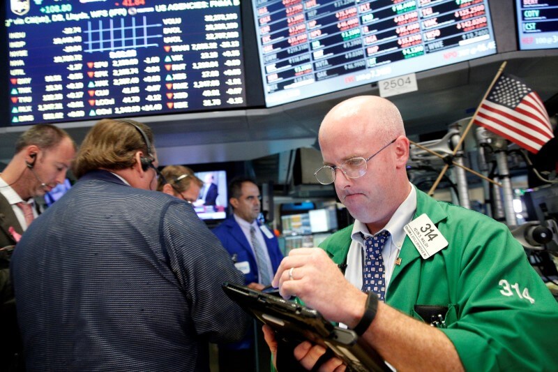 Energy, financial stocks give Wall St. modest lift