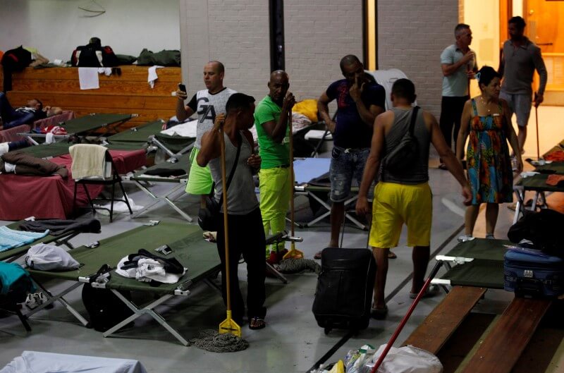 Cuba blames U.S. open door for migrant surge