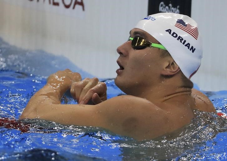 Swimming: Adrian powers through to 100m free final
