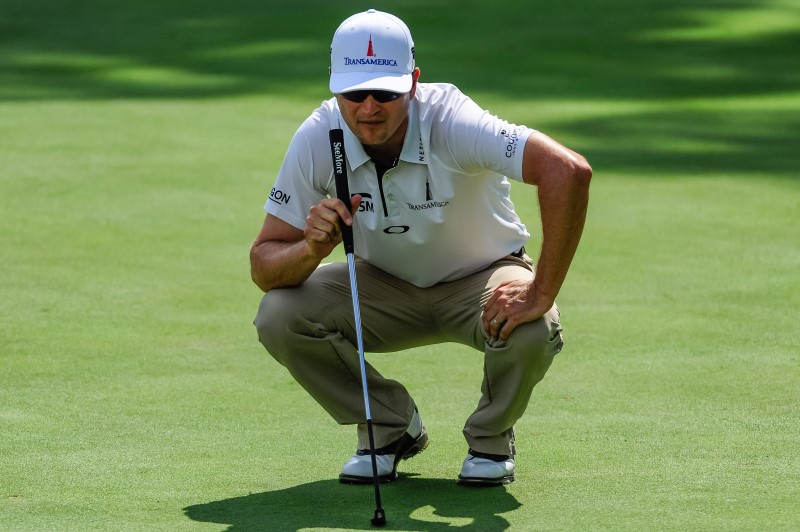 Johnson shares Deere Classic lead when play suspended