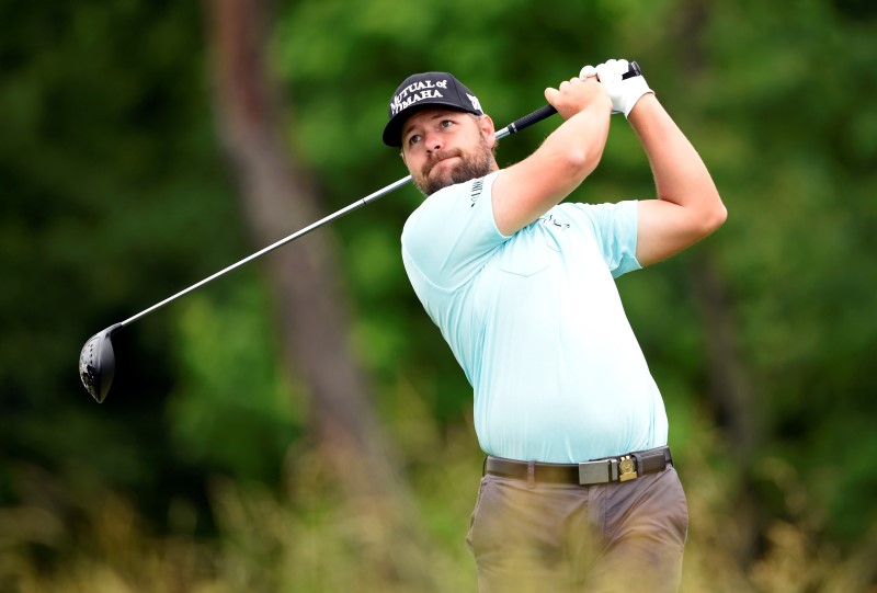 Moore finishes in the dark to lead John Deere Classic
