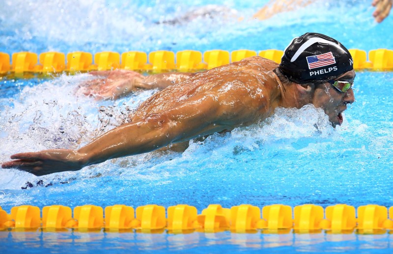 Phelps leaves Olympic pool but not the sport
