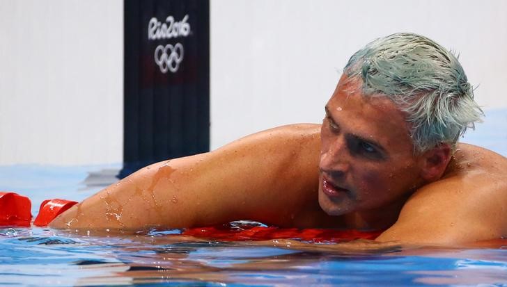 Police seek taxi driver after U.S. swimmer Lochte robbed in Rio