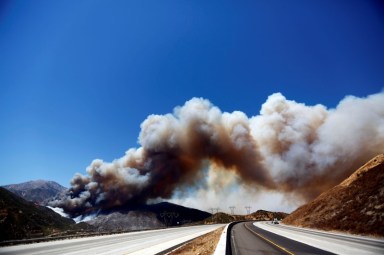Southern California wildfire rages unchecked after evacuations